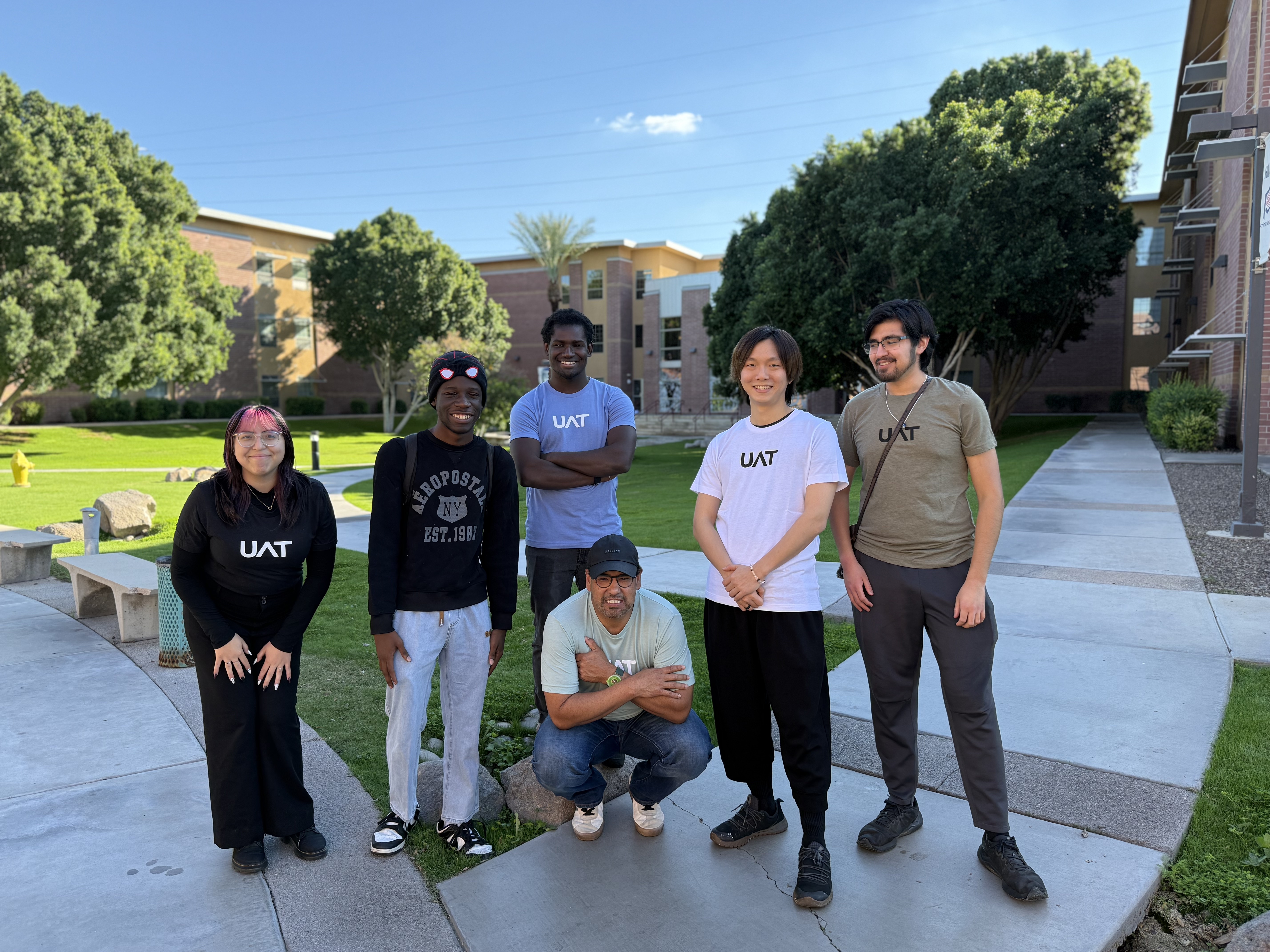 Mason Jyun Wang and UAT students on campus in Tempe, AZ